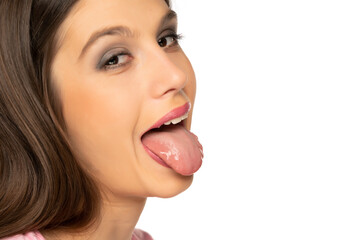portrait of young woman with tongue out