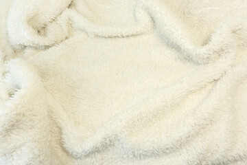 Fototapeta na wymiar Full frame of drapery short fluffy fur soft white fabric.