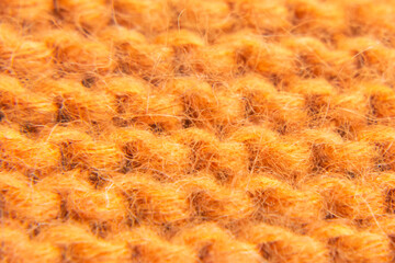 Knitted wool pattern. knitting close-up. Woolen background