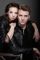 cool man and woman on gray background