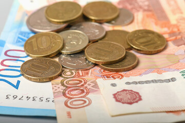 Cash banknotes and coins background. Background of Russian money banknotes. Paper rubles and coins background.