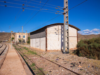 Fototapeta na wymiar buildings of the Santa Fe de Mondujar train station (Spain)