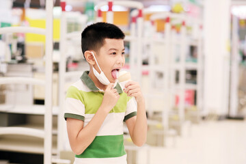 Boy eating ice cream cone