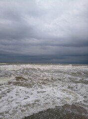 muddy sea water on a cloudy day