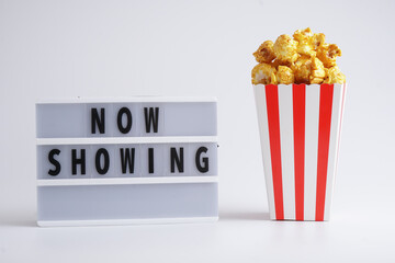 Caramel pop corn on box isolation white background. Copy space for text.
