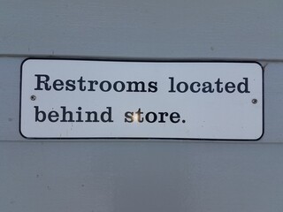 restrooms located behind store sign