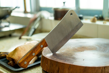 A kitchen knife on a cutting board