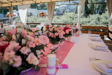 banquet table in a restaurant with flower decor