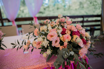 banquet table in a restaurant with flower decor