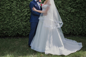 bride and groom in the park