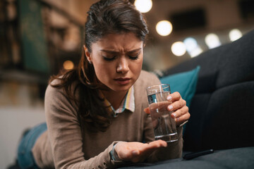 Beautiful businesswoman working on lap top. Tired woman having headache while working.	
