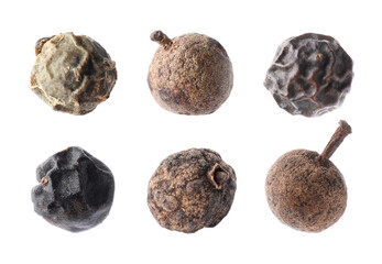 Set of different peppercorns on white background