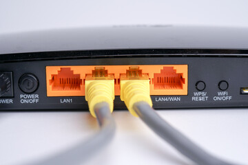 WiFi Modem Router ADSL connected with LAN RJ45 Cable. It is a LAN network connection ethernet cable. Internet cord RJ45
