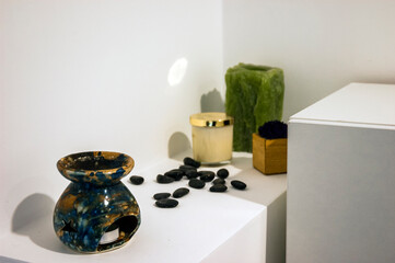 Beauty parlour decorated corner with oil burner and aroma candles