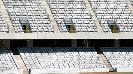 Soccer stadium with empty seats.