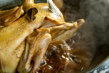 Fototapeta na wymiar Braised duck being made in the pot, boiling soup water