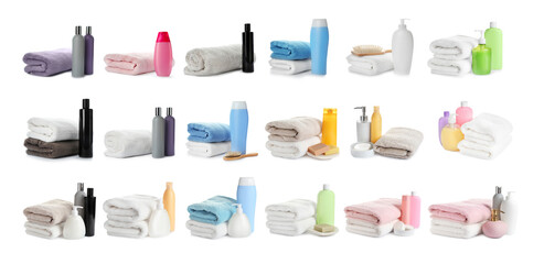 Set of folded soft terry towels and toiletries on white background