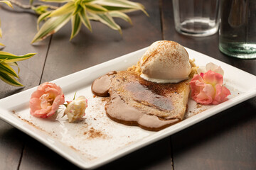 crepe with caramel dulce de leche filling and vanilla ice cream