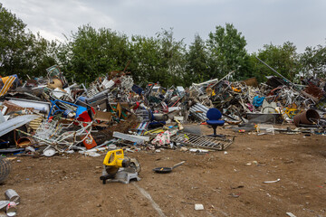 Sweden - August 17, 2011: One of the scrap yard (heap), junkyard, dump with a lot of different things