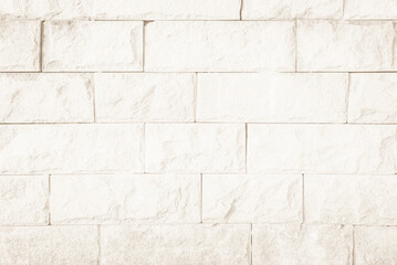 Obraz premium Brown brick wall texture background in room at subway. Brickwork stonework interior, rock old clean concrete grid uneven abstract weathered bricks tile design, horizontal architecture wallpaper.