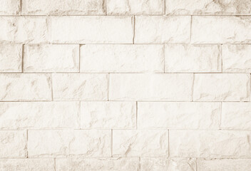 Brown brick wall texture background in room at subway. Brickwork stonework interior, rock old clean concrete grid uneven abstract weathered bricks tile design, horizontal architecture wallpaper.