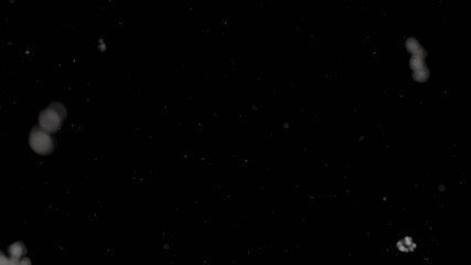 dust particles on black background, flying dirt overlay texture with depth of field 