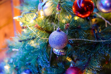 Christmas tree and Christmas decorations, Beautiful decorated christmas tree. Holiday background. Closeup