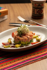 salmon fish avocado and tomatoes steak tartar - peru