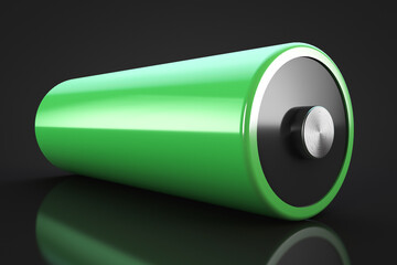 Green battery cell on a black background.