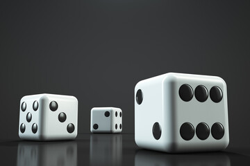 Three white dice on a black table.