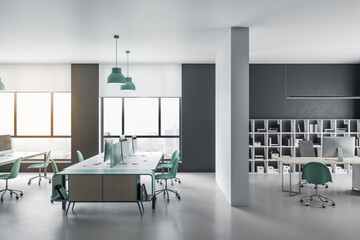 Coworking office interior with equipment and computers