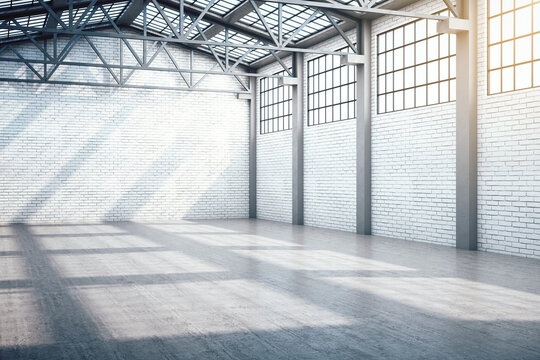 Modern warehouse interior with window and daylight.