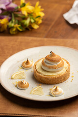 Lemon tart pie with whipped cream desert