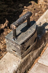 Vintage iron closeup on the border track the background of the earth