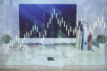 Forex graph hologram on table with computer background. Double exposure. Concept of financial markets.