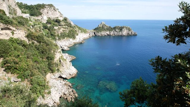 Promontory and tower of Capo di Conca in the municipality of Conca dei Marini. Coastal tower on the mediterranean sea. Amalfi Coast, Salerno, Campania, Italy