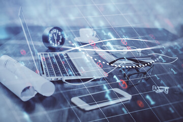 Forex Chart hologram on table with computer background. Multi exposure. Concept of financial markets.