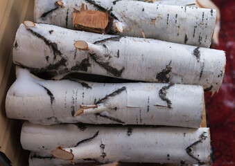 birch firewood in the winter folded in a pile