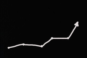 Chalkboard finance business graph showing upward trend.trend success increase and financial...