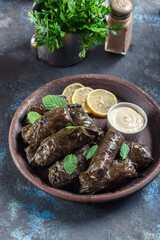 Dolma - stuffed grape leaves with rice and meat