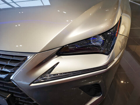 Cardiff, UK: November 16, 2018: Lexus NX300h car front near off-side wing and head light. Lexus is the luxury vehicle division of Japanese automaker Toyota.