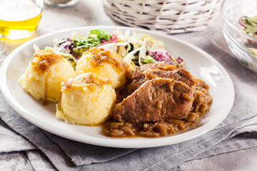 Braised pork loins with onion sauce