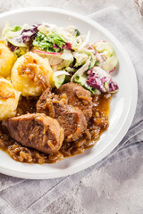 Braised pork loins with onion sauce