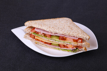 Club sandwich with ham and cheese