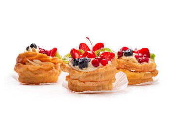 Home made cake with cream and fruits isolated.