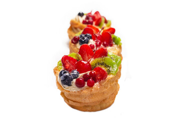 Home made cake with cream and fruits isolated.
