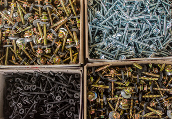 screws made od steel, Screw background on wooden background, mechanic work desk.