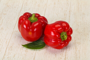 Ripe Red bell pepper over wooden