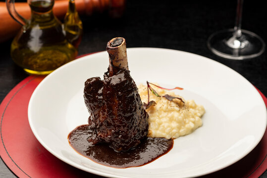 Braised Lamb Shanks, Stinco di agnello vitello brasato with sauce and risotto