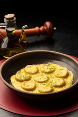 Ravioli pasta egg yolk raviolo stuffed with sauce gravy